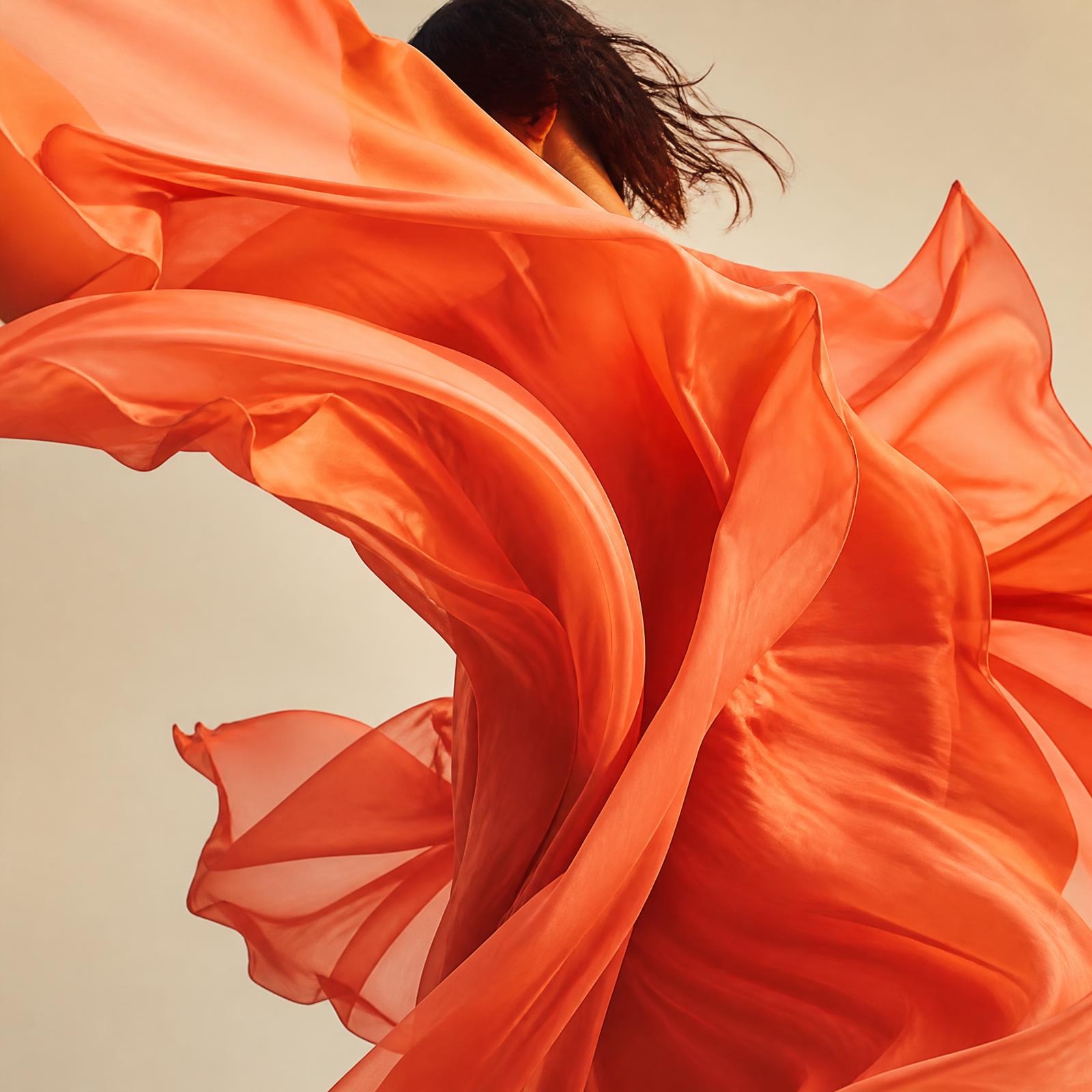 Movement in coral silk